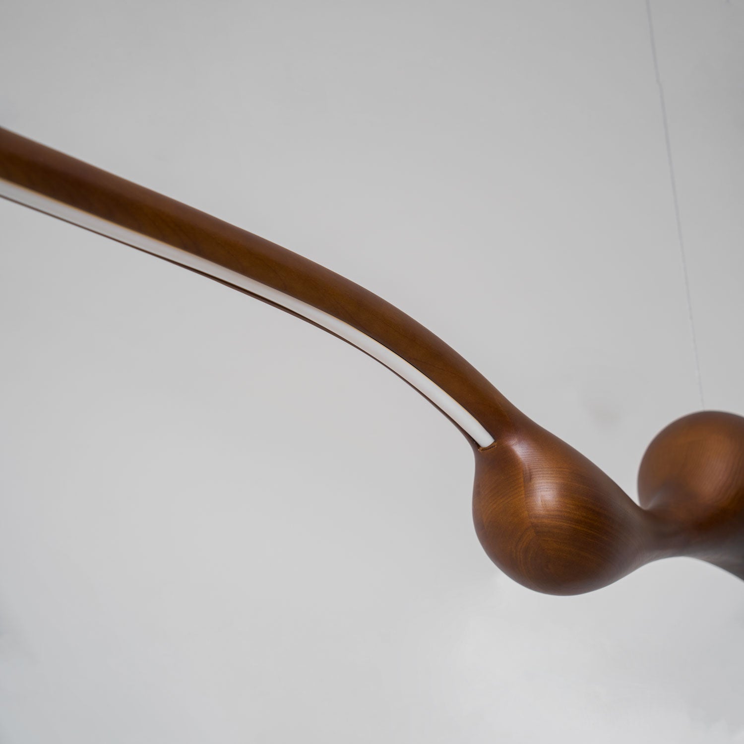 Ardena Sculpted Wood Linear Pendant Lamp
