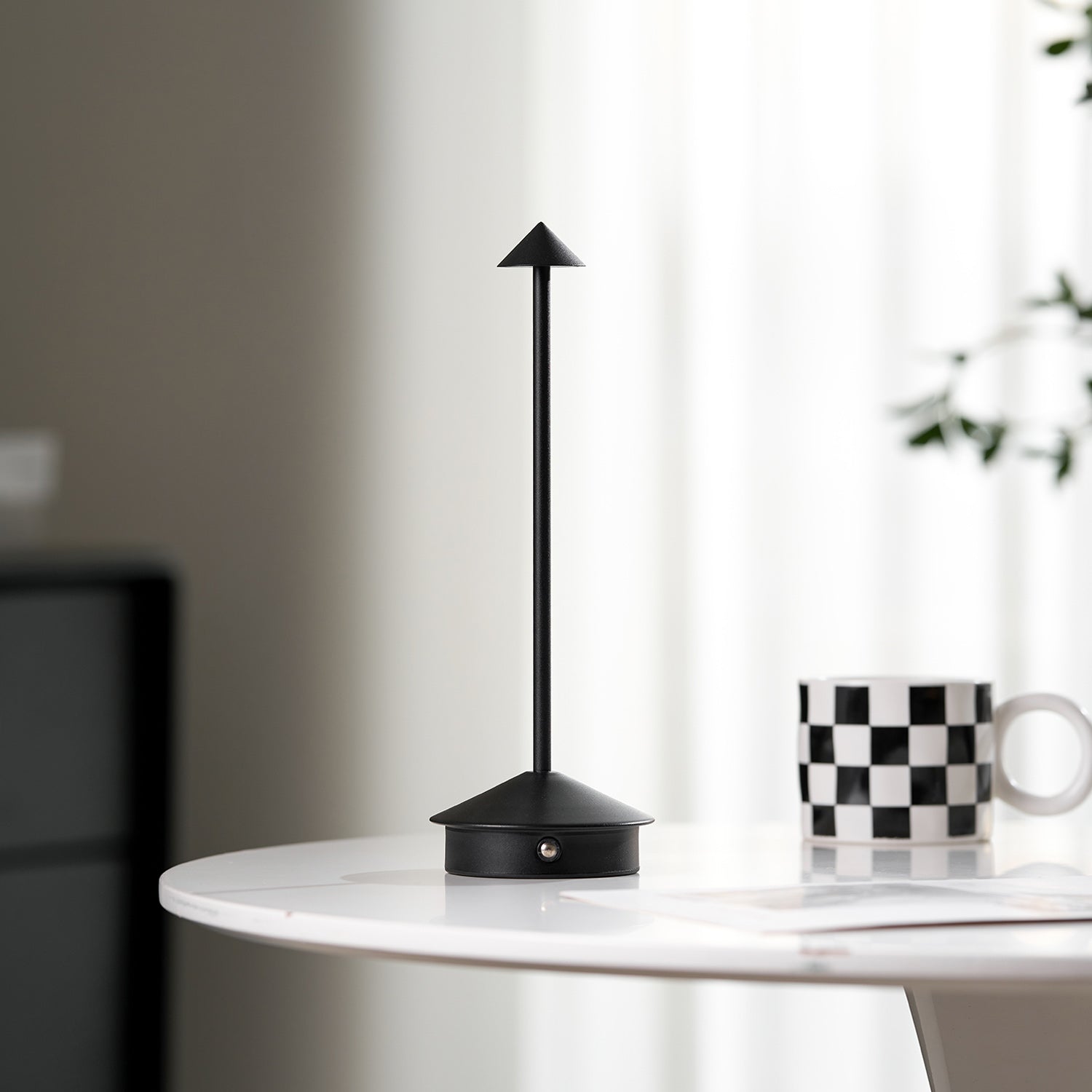 Pina cordless task lamp in a styled interior